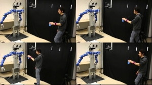 Harmonising Human Robot Interaction: Guang-Zhong Yang gives plenary at IROS 2016